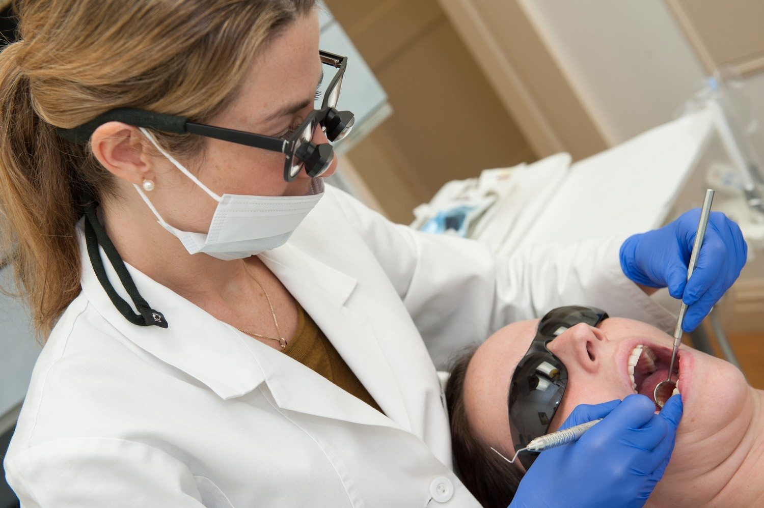Julie Hassid with patient